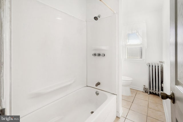 bathroom with shower / bathtub combination, tile patterned floors, toilet, and radiator