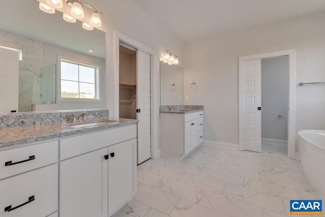 bathroom with shower with separate bathtub and vanity