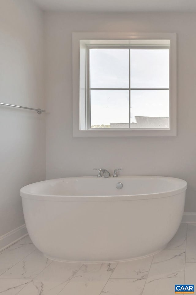 bathroom with a tub