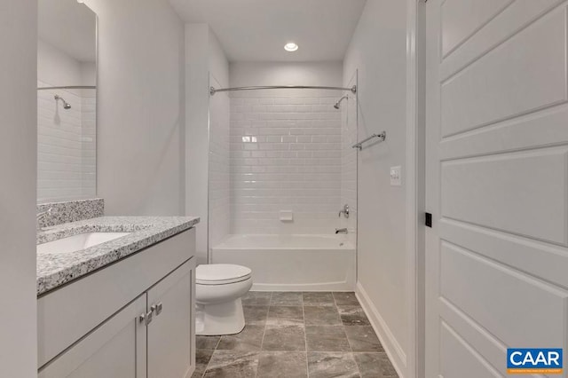 full bathroom featuring vanity, toilet, and tiled shower / bath combo