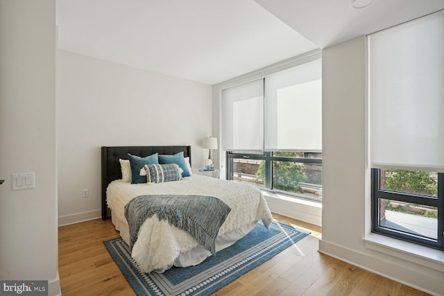 bedroom featuring light wood-type flooring