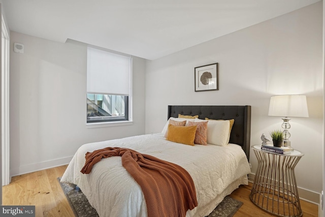 bedroom featuring light hardwood / wood-style floors