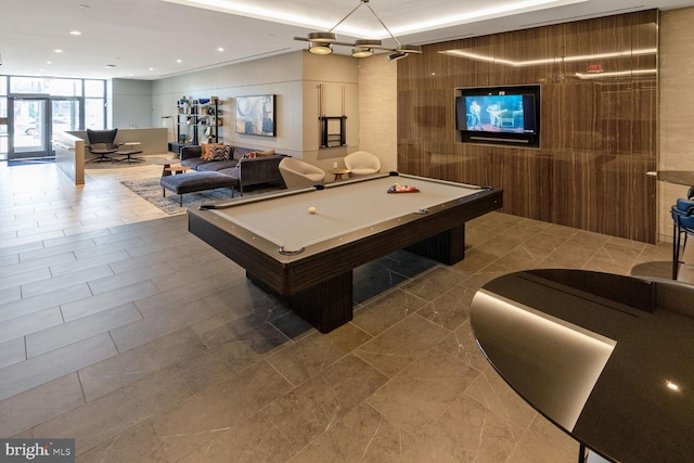 recreation room featuring expansive windows and pool table