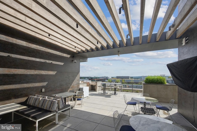 view of patio featuring a pergola