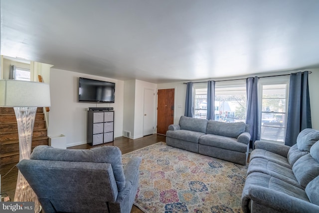 living room featuring dark hardwood / wood-style floors