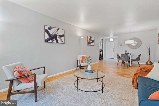 living room with light parquet floors