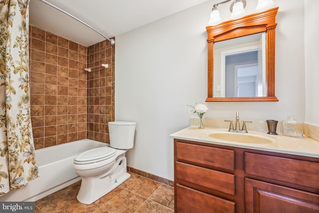 full bathroom featuring tile patterned floors, vanity, toilet, and shower / tub combo with curtain