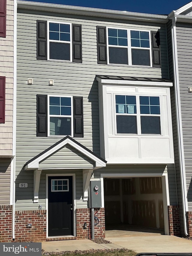 view of property featuring a garage