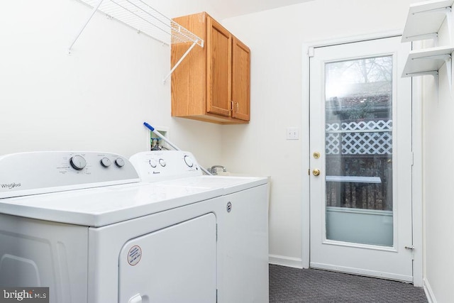 laundry area with cabinets and washer and dryer