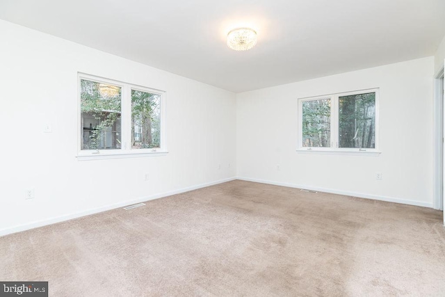 view of carpeted spare room