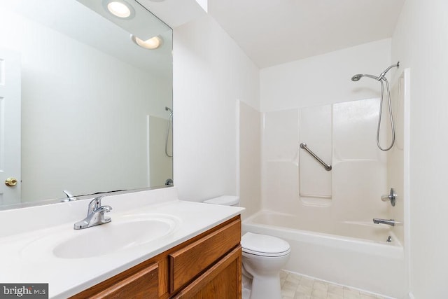 full bathroom featuring vanity,  shower combination, and toilet