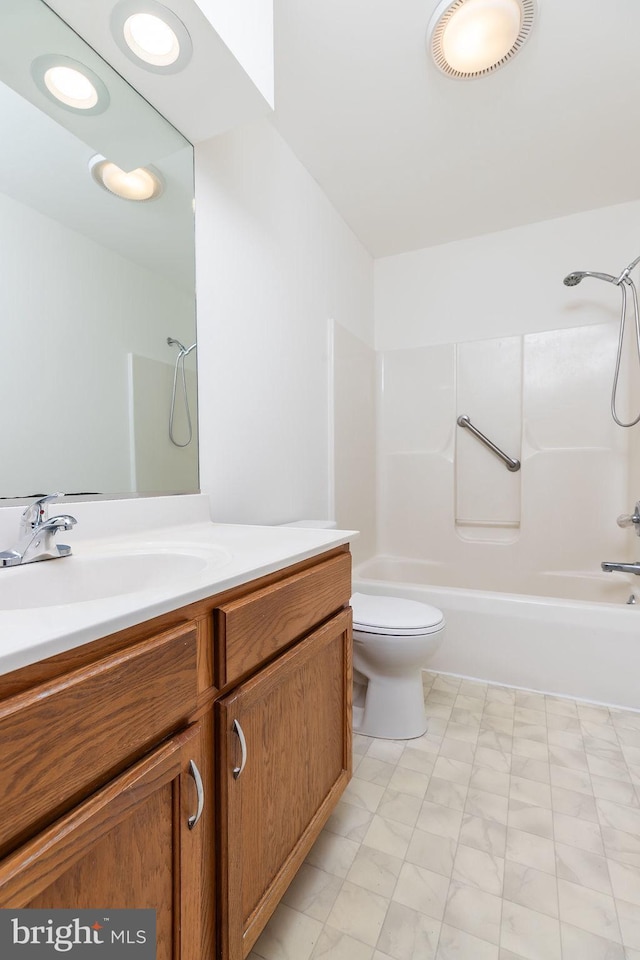 full bathroom featuring vanity, toilet, and shower / washtub combination