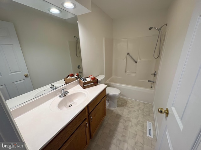 full bathroom featuring shower / tub combination, vanity, and toilet