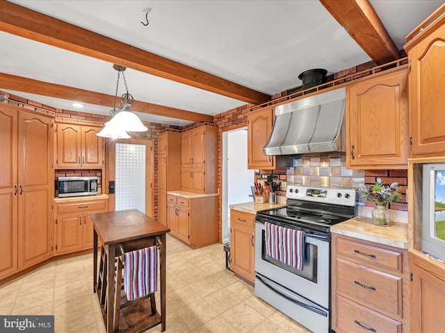 kitchen featuring pendant lighting, electric range, backsplash, and range hood