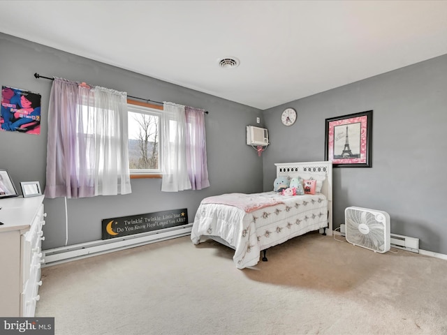 bedroom featuring a wall unit AC, carpet floors, and a baseboard heating unit