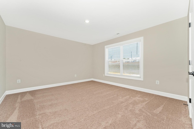 view of carpeted spare room