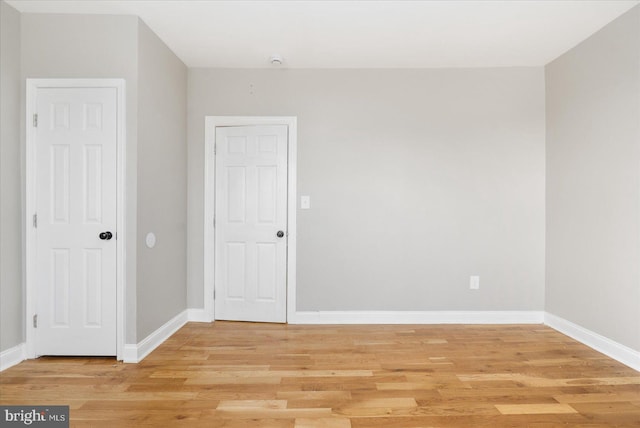 empty room with light wood-type flooring