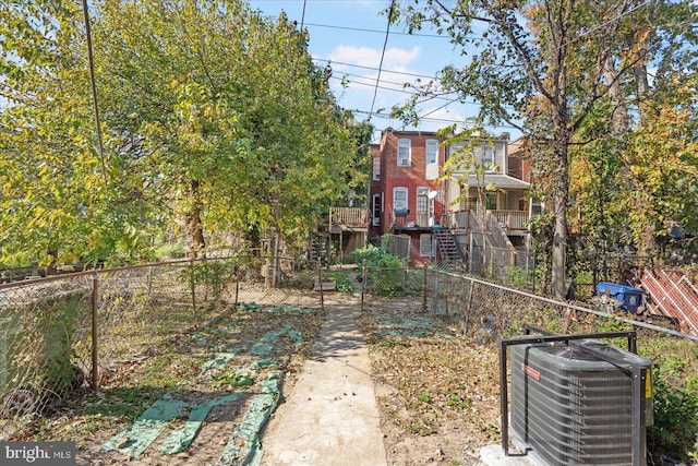 view of yard featuring central AC