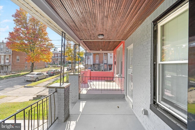 balcony featuring a porch