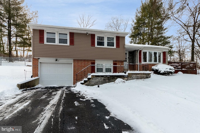 tri-level home featuring a garage