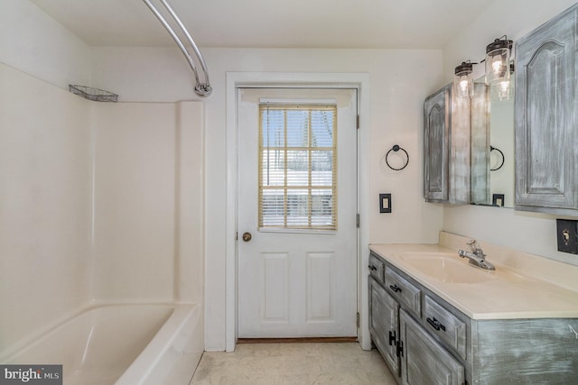 bathroom featuring vanity and bathtub / shower combination