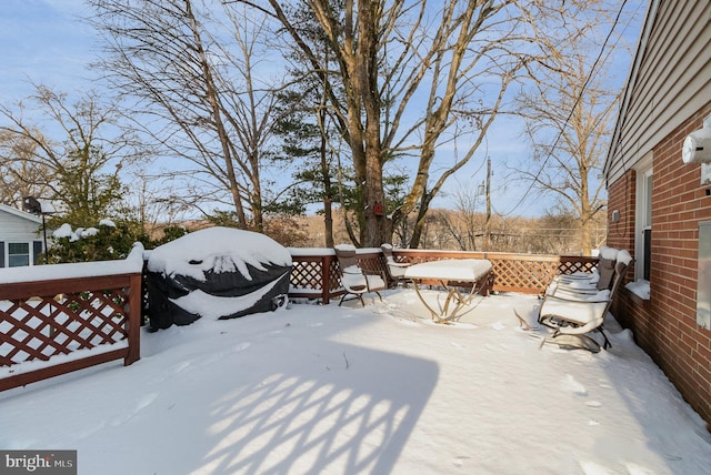 view of snow covered deck