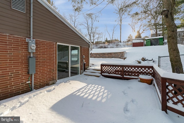 view of snow covered deck