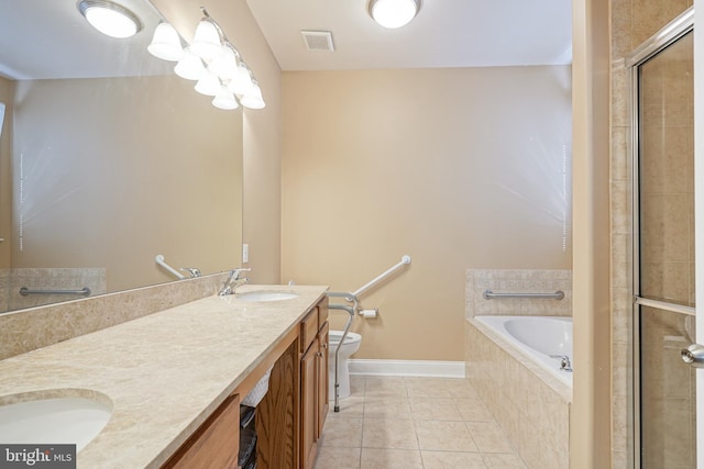 full bath featuring visible vents, toilet, a sink, a bath, and tile patterned floors