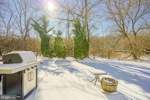 view of snow covered patio