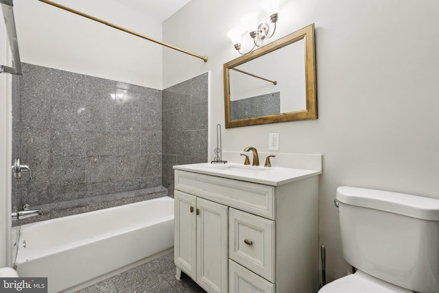 full bathroom with vanity, toilet, and tiled shower / bath