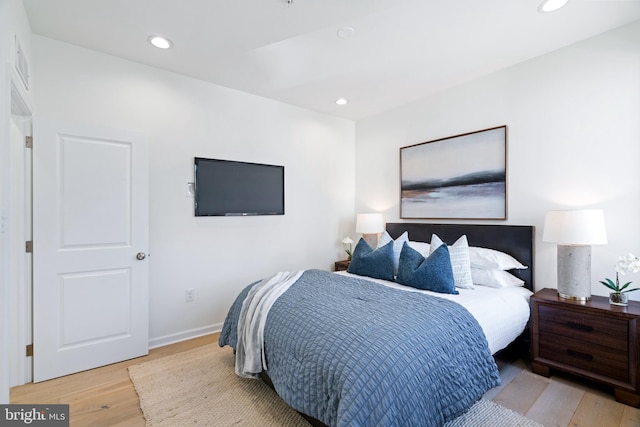 bedroom featuring light wood-type flooring