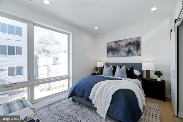 bedroom featuring light hardwood / wood-style flooring