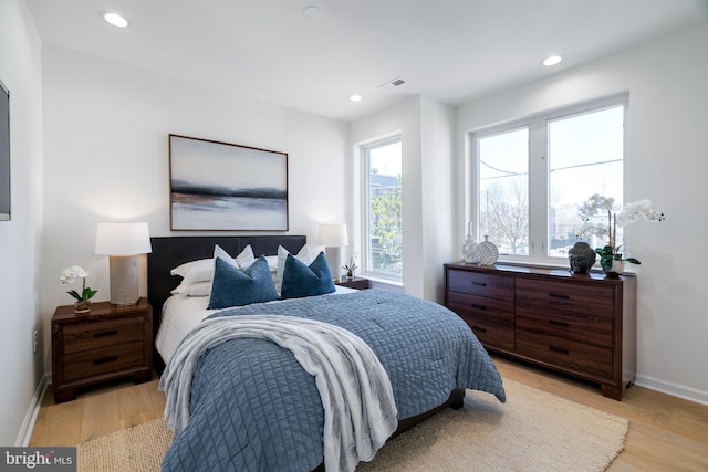 bedroom featuring light hardwood / wood-style flooring