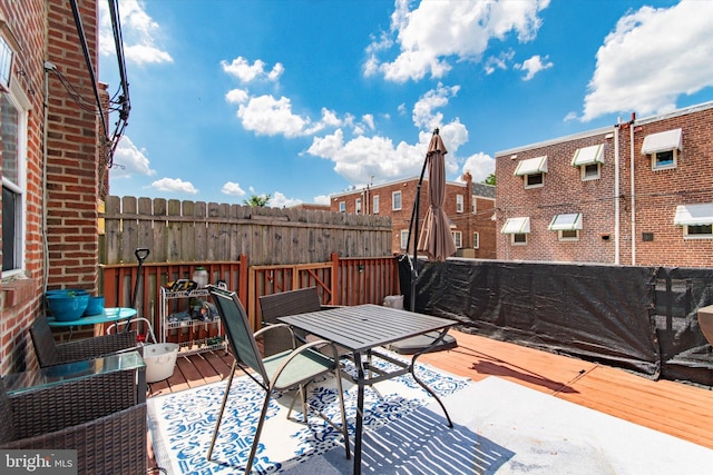 view of patio / terrace featuring a wooden deck