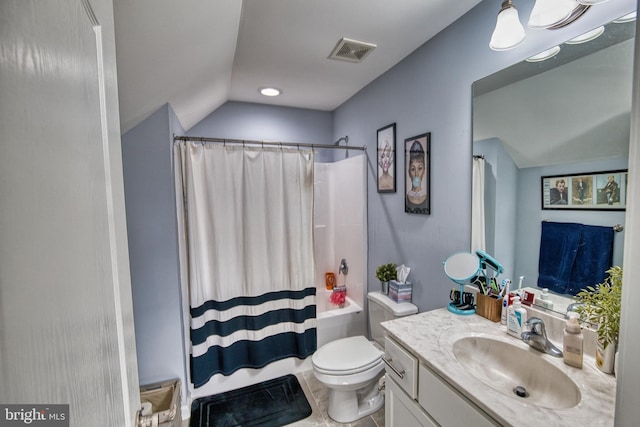 full bathroom featuring tile patterned floors, vanity, vaulted ceiling, shower / bathtub combination with curtain, and toilet