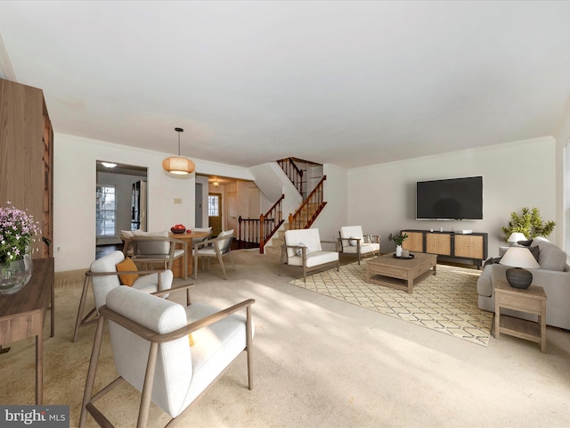 carpeted living room featuring crown molding