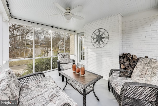 sunroom / solarium with ceiling fan