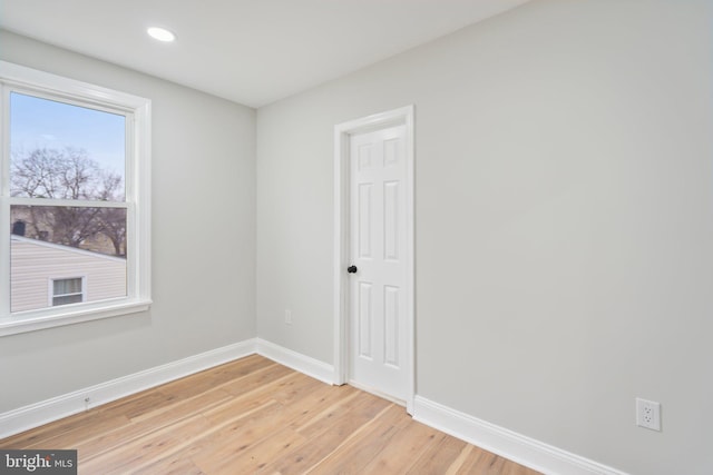 unfurnished room featuring light hardwood / wood-style flooring