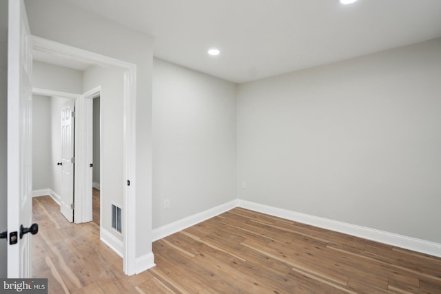 empty room featuring light hardwood / wood-style floors