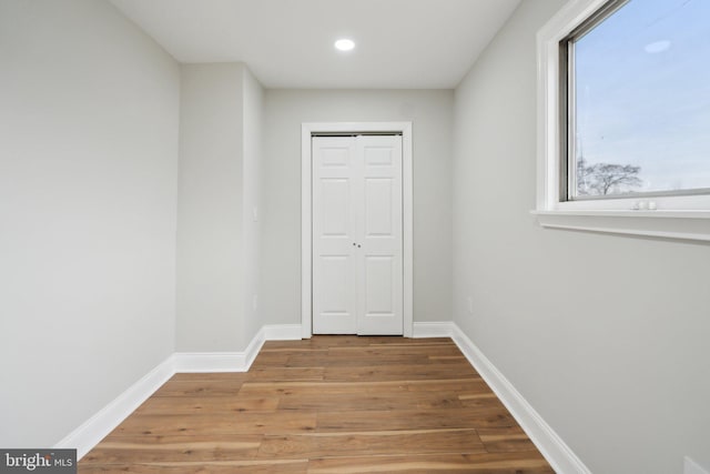 interior space with hardwood / wood-style floors