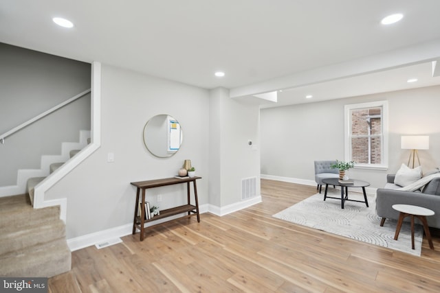 living area featuring light hardwood / wood-style floors