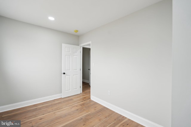 unfurnished room featuring light wood-type flooring