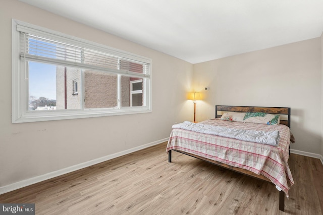 bedroom featuring light hardwood / wood-style floors