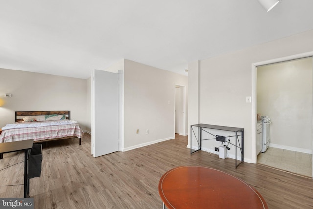 bedroom with light hardwood / wood-style flooring