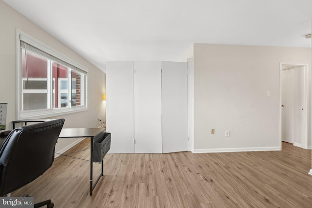 office area with light hardwood / wood-style flooring