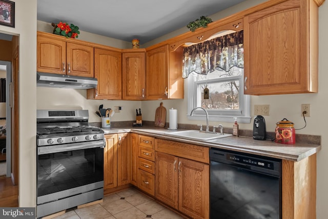 kitchen with sink, dishwasher, light tile patterned flooring, and stainless steel gas range oven