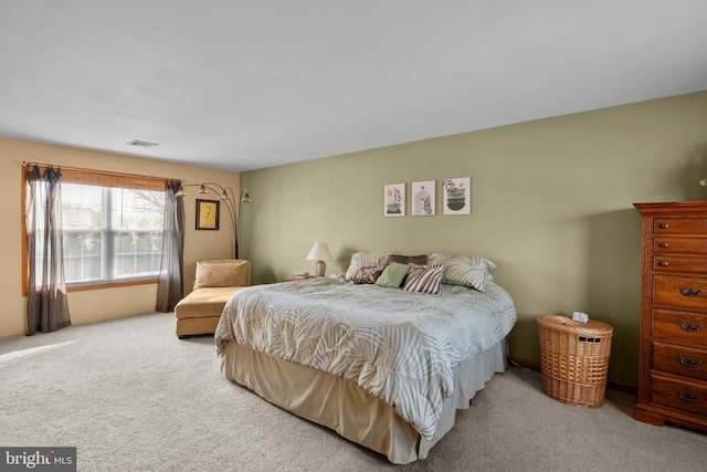 bedroom featuring carpet