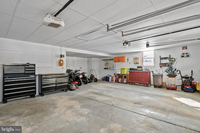 garage featuring a garage door opener