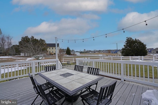 deck featuring a lawn