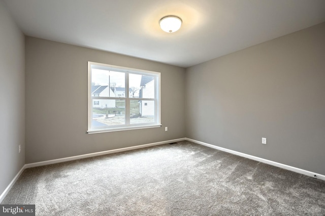 empty room with carpet floors